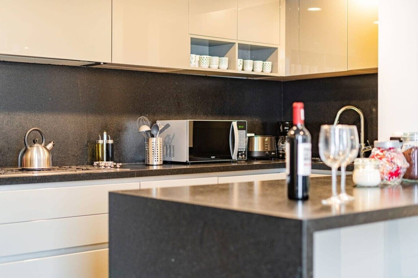 Coffee/tea maker, fridge, microwave, oven