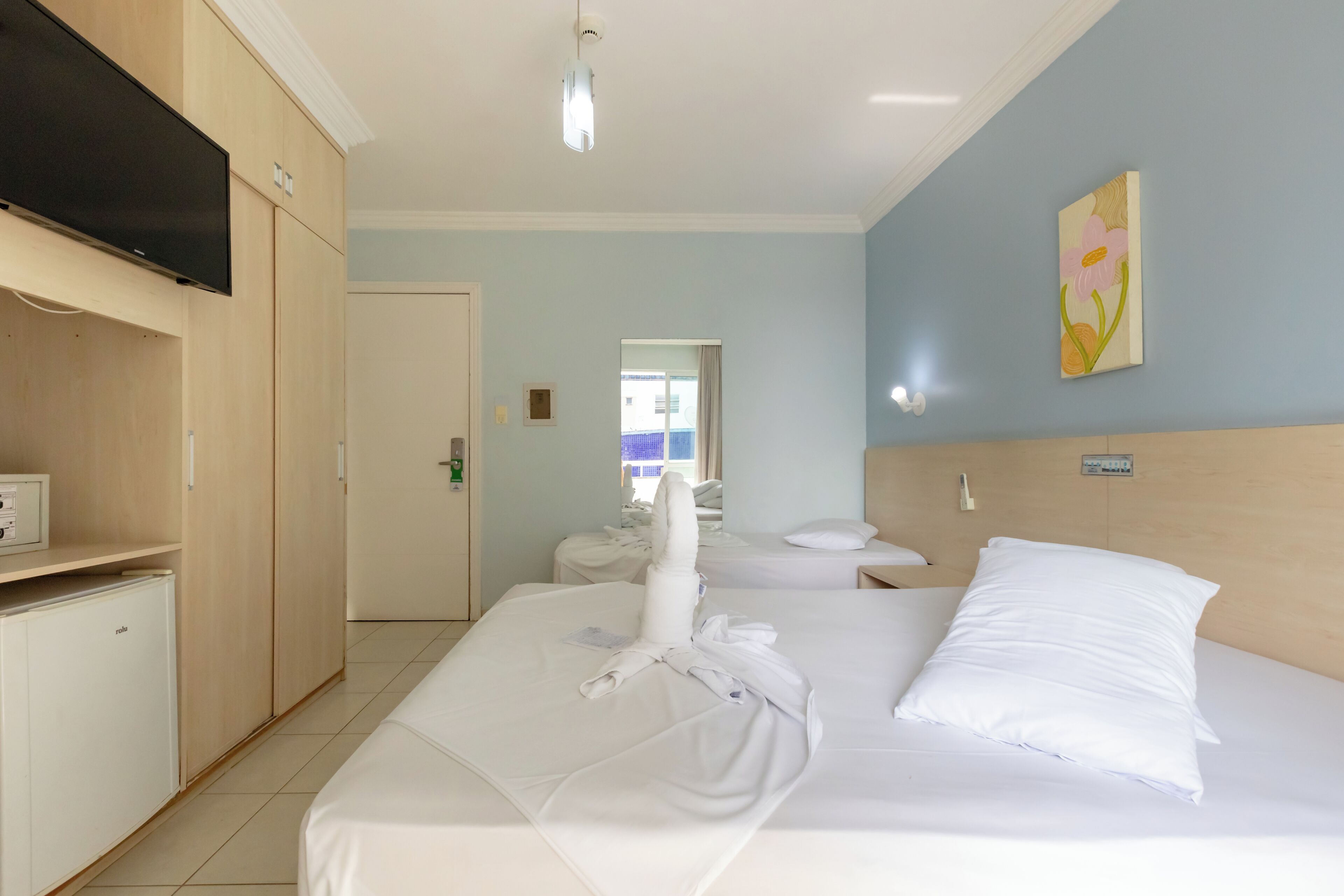 Quarto clássico, ar-condicionado | Cofres nos quartos, Wi-Fi de cortesia, roupa de cama