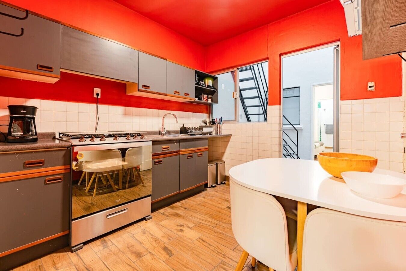 Coffee/tea maker, fridge, microwave, oven