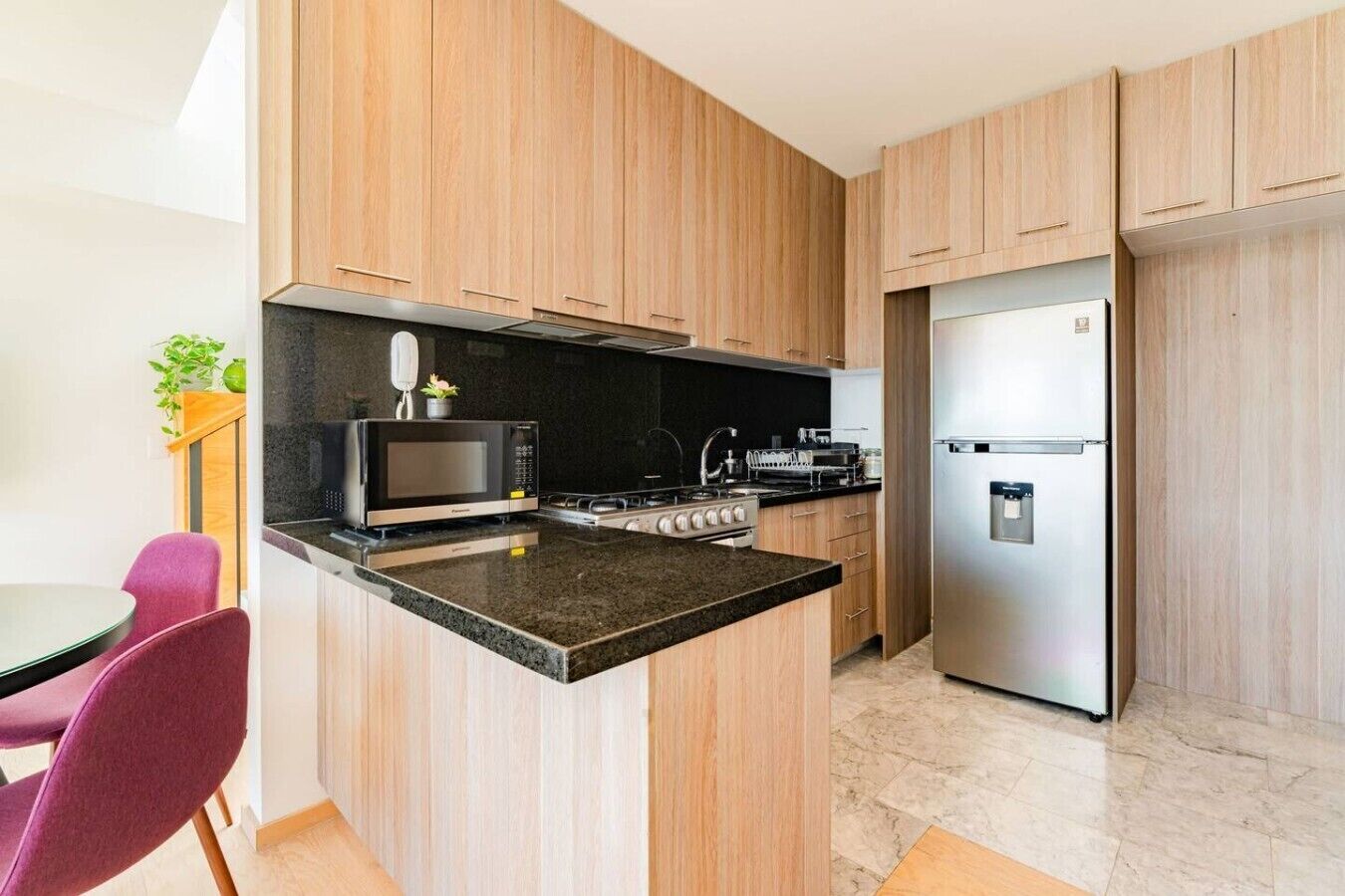 Coffee/tea maker, fridge, microwave, oven