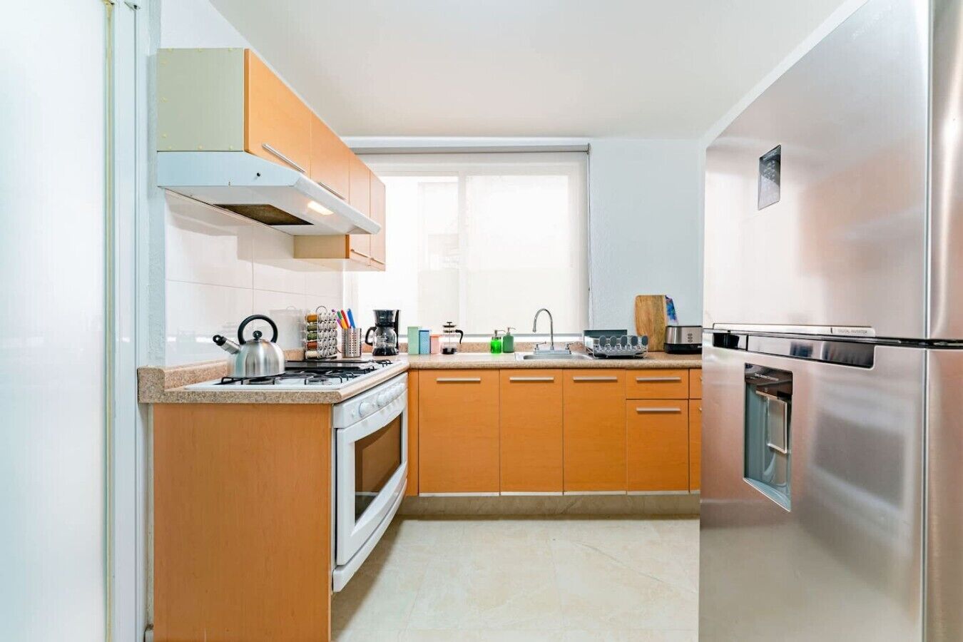Coffee/tea maker, fridge, microwave, oven