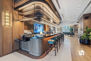 Lush outdoor pergolas offer perfect spots for relaxation. - Bay-View High-Rise: Private Balcony, Pool & Gym (Miami)