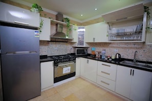 Private kitchen - Cairo Taj Dokki Families Tower Hotel (Giza)