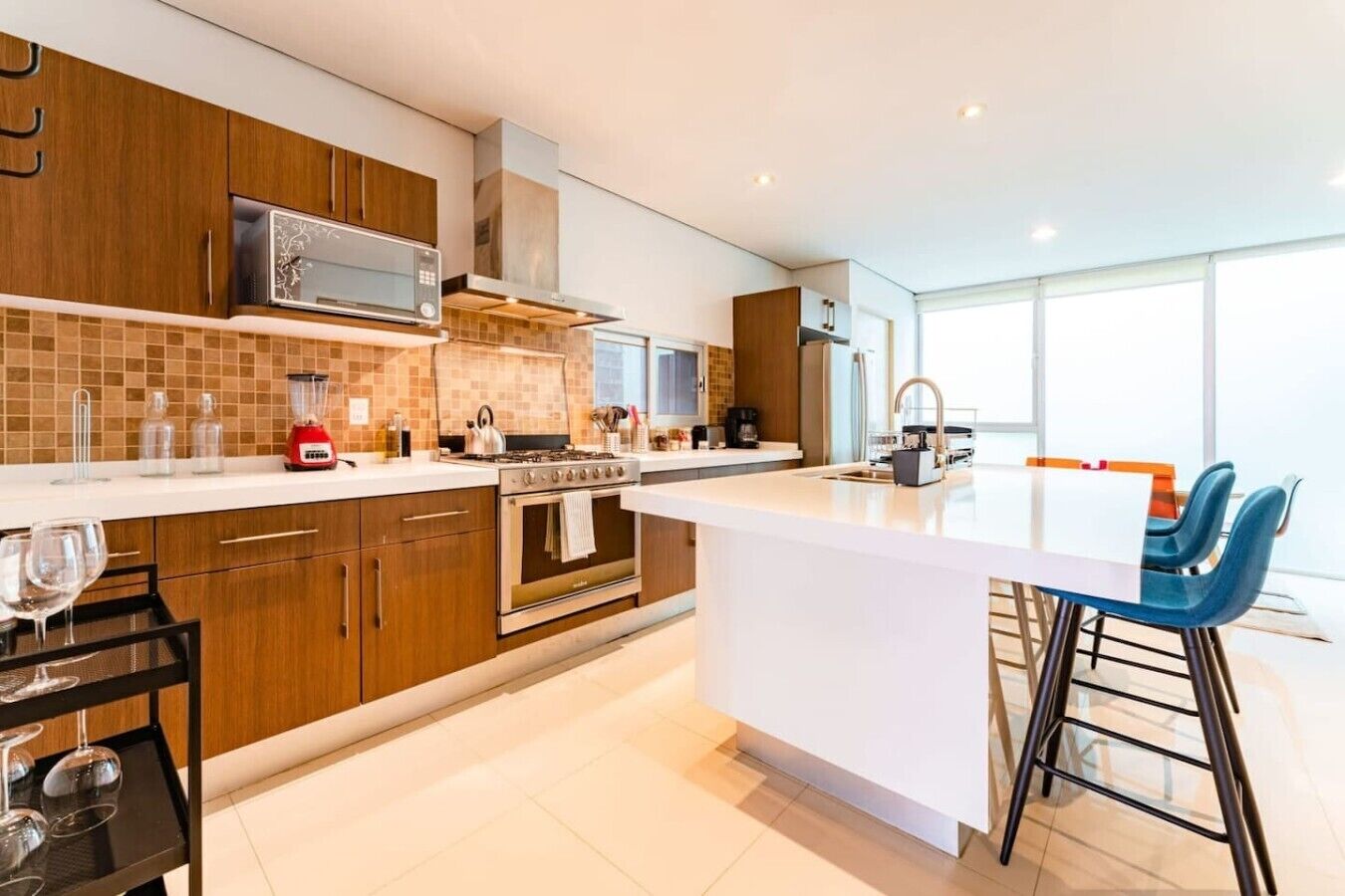 Coffee/tea maker, fridge, microwave, oven