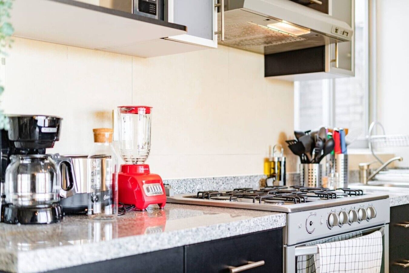 Coffee/tea maker, fridge, microwave, oven