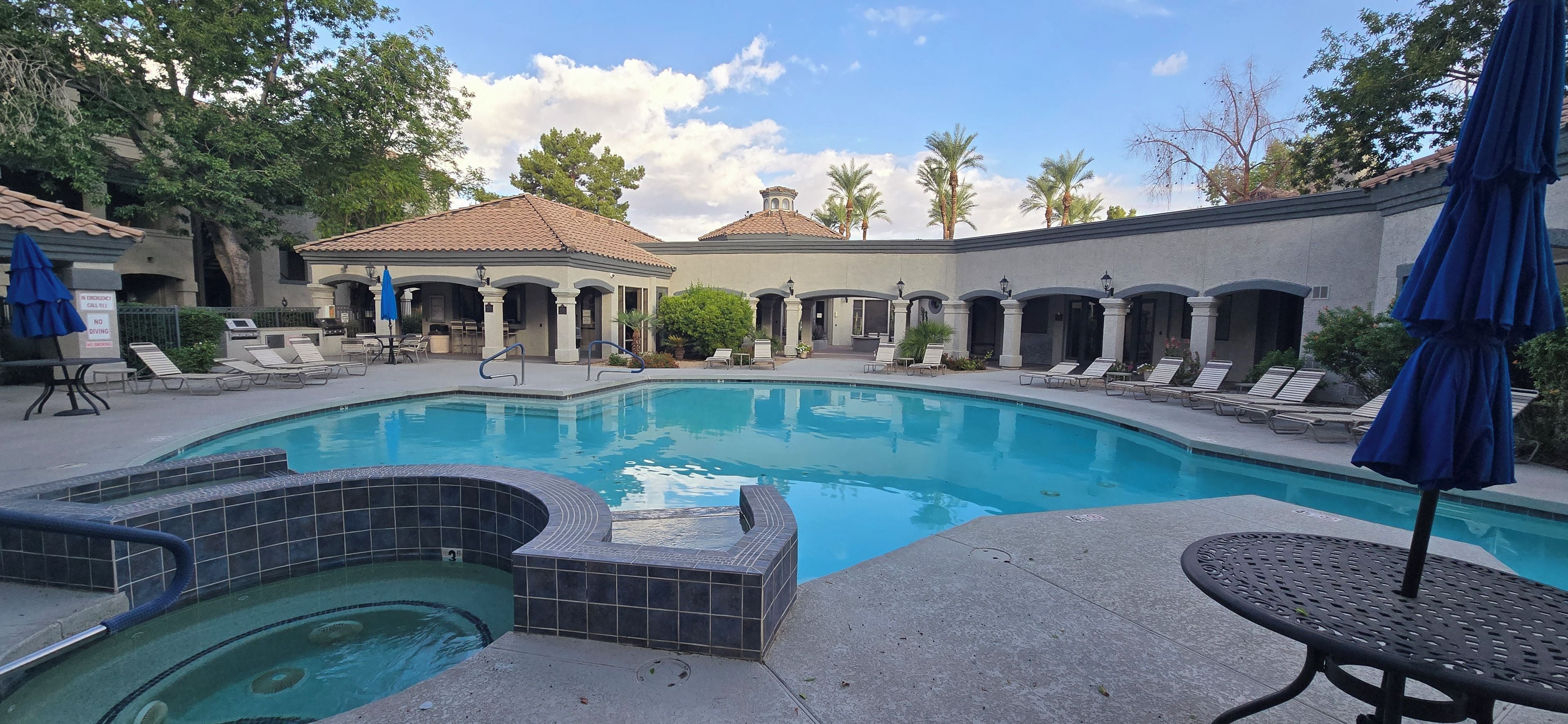 Resort style pool and spa with BBQ area.  One of two pools and spas in complex.