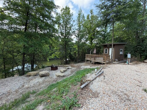 Cozy 1-bedroom “tiny” cabin with strip pit fishing and woods to explore!