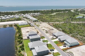 Unclassified image, 4 of 57, button - Family Fun HQ | GolfCart+Weights+Bikes & Nex Play (Port St. Joe)