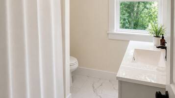 Hair dryer, towels, soap, toilet paper
