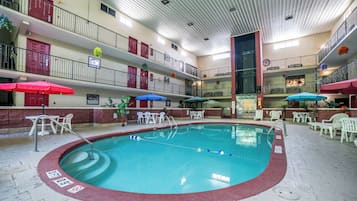 Indoor pool, open 9:00 AM to 10:00 PM, pool umbrellas