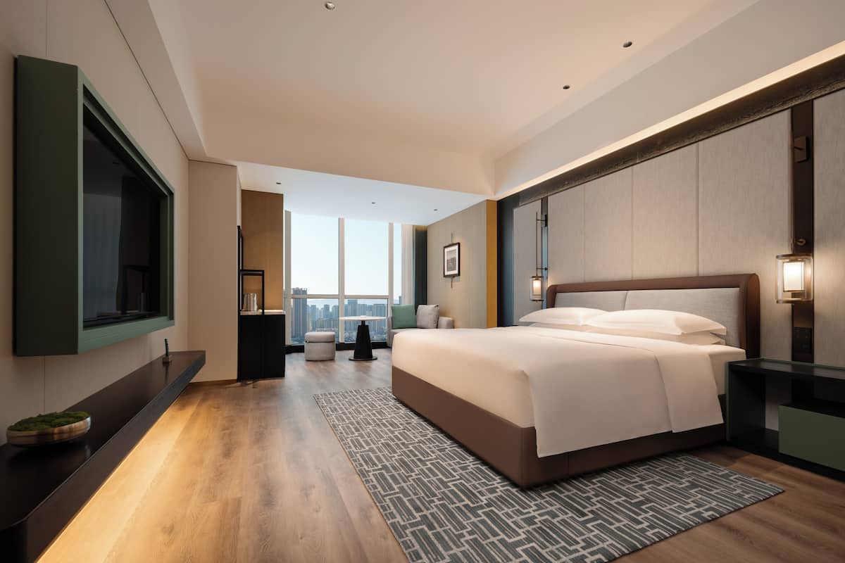 Habitación individual Deluxe, vistas a la ciudad | Caja fuerte, escritorio, espacio para trabajar con un portátil