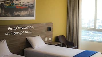 Habitación con 2 camas individuales, vista a la playa | Wifi gratis