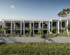 A modern building with a series of rectangular windows and a flat roof. - NEXA Residences Canggu (Canggu)