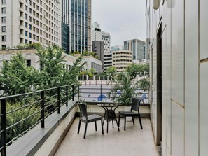 Signature Quadruple Room, Terrace, City View | Property grounds