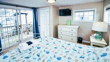Tabla de planchar con plancha, wifi, ropa de cama