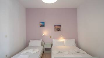 Habitación triple | Wifi gratis y ropa de cama