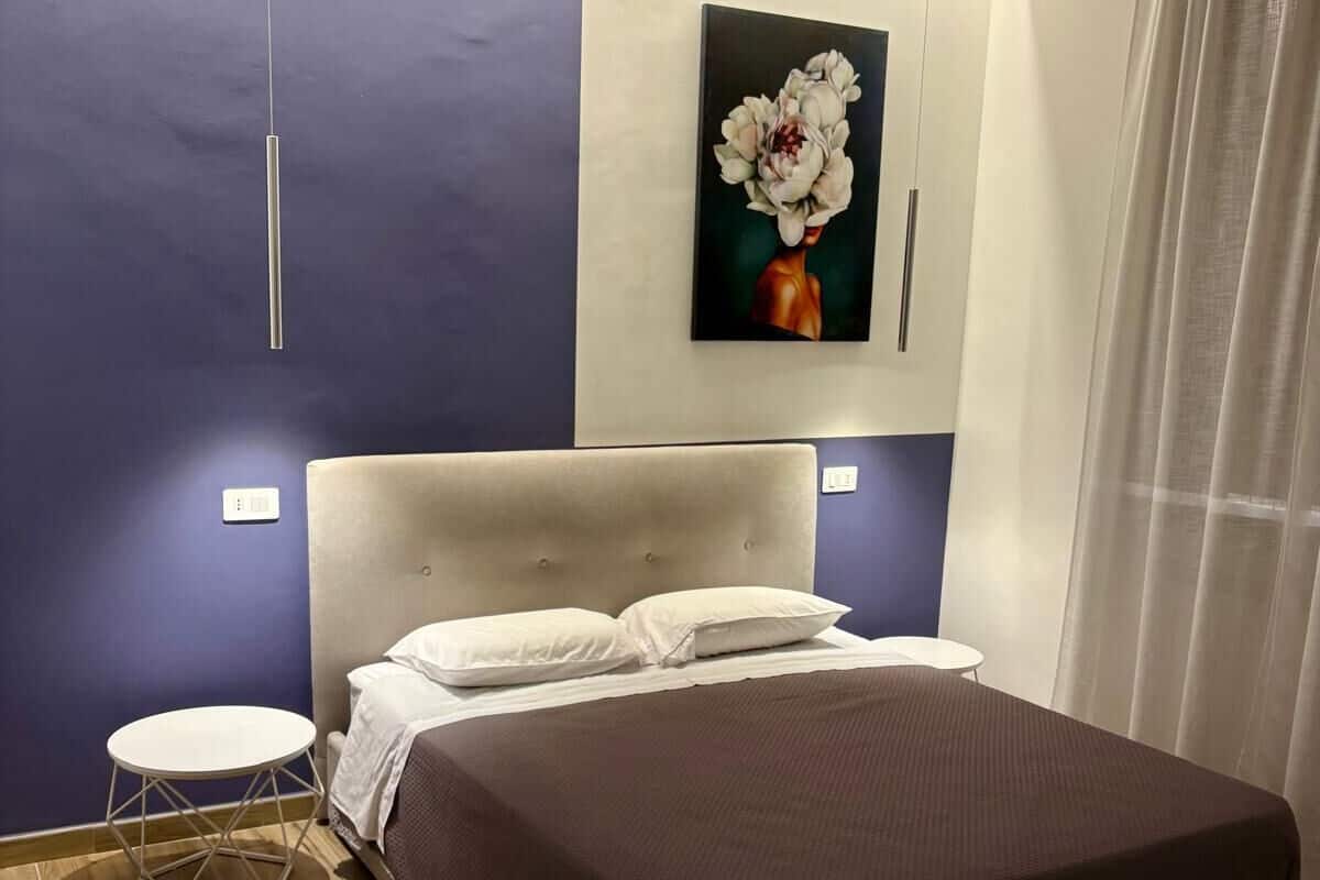 Familien-Vierbettzimmer, Nichtraucher, Balkon | Minibar, Verdunkelungsvorhänge, schallisolierte Zimmer, kostenloses WLAN
