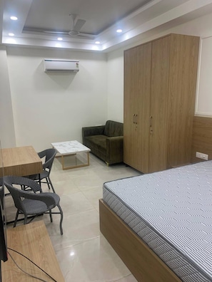 Premium bedding, in-room safe, desk, laptop workspace - Urban Alcove Executive Suites by Luxe 8 (Gurugram)