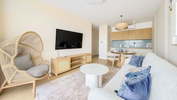 Apartment (306) | Living area | 30-inch flat-screen TV with digital channels