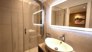 Comfort Room, 1 King Bed, City View | Bathroom | Shower, hair dryer, towels, soap