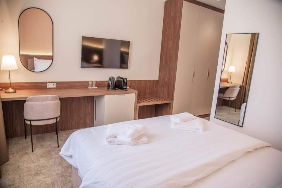 Standard Double Room, City View | In-room safe, desk, laptop workspace, soundproofing