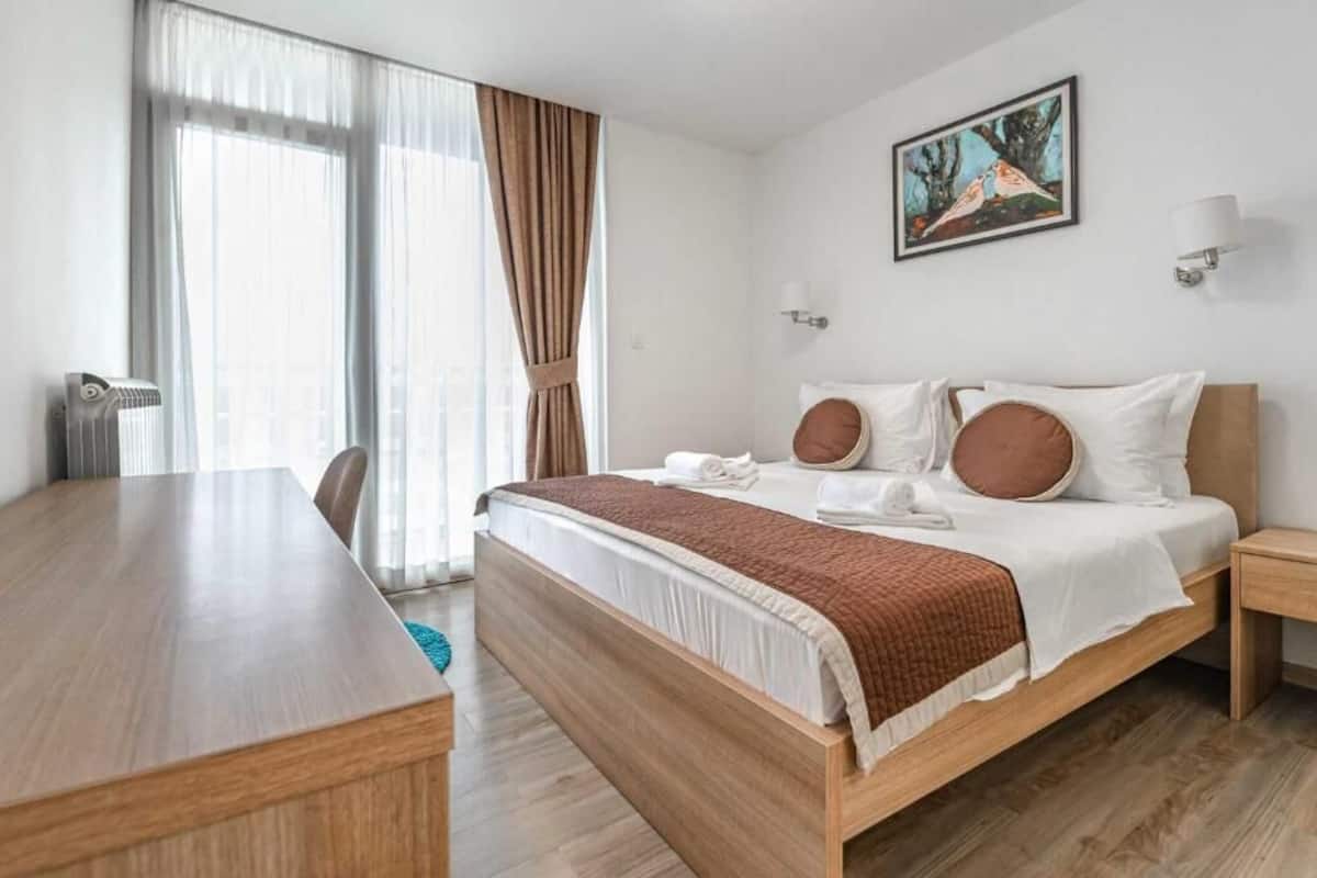 Family Apartment, Balcony, City View | In-room safe, desk, laptop workspace, soundproofing