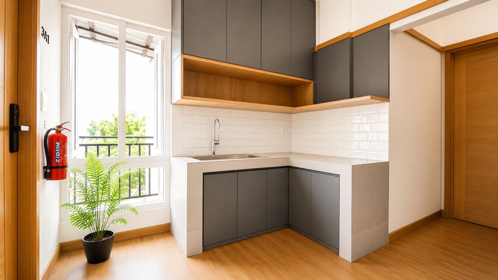 Une cuisine moderne avec des meubles gris, un plan de travail blanc et un plancher en bois.