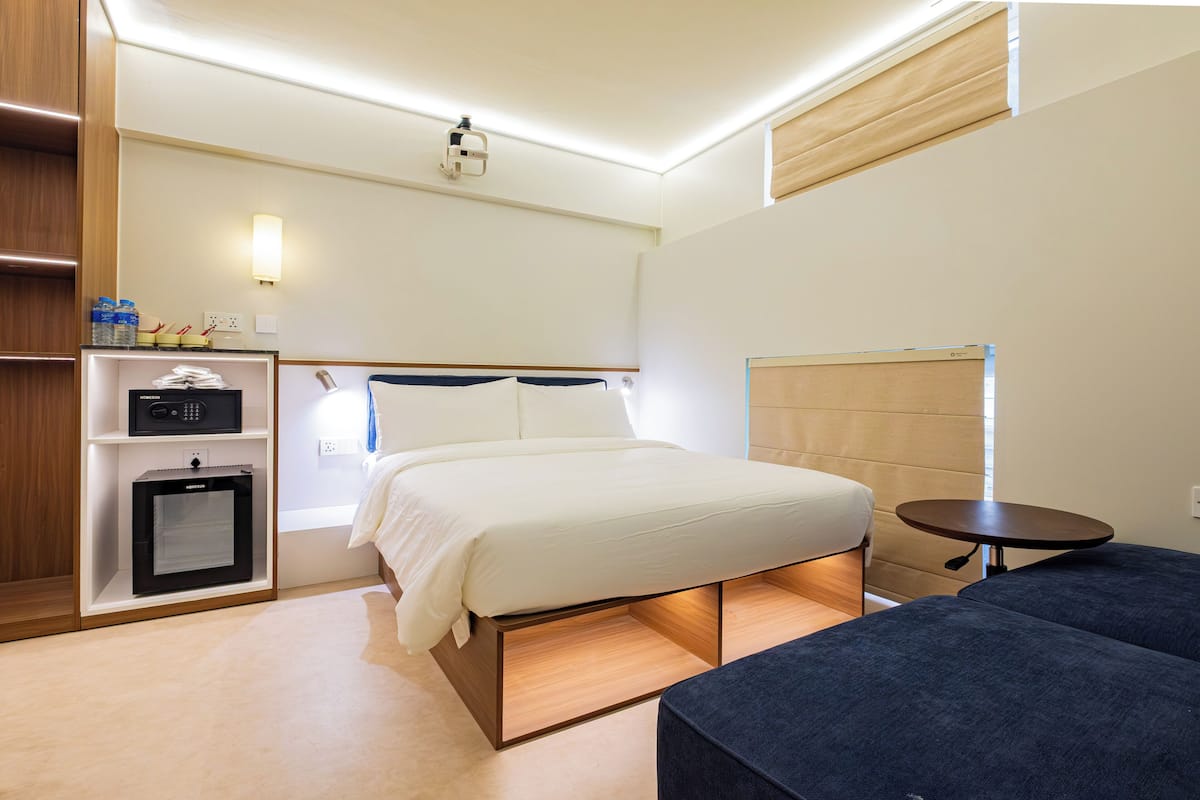 Suite familiar | Minibar, caja de seguridad en la habitación, wifi gratis y ropa de cama