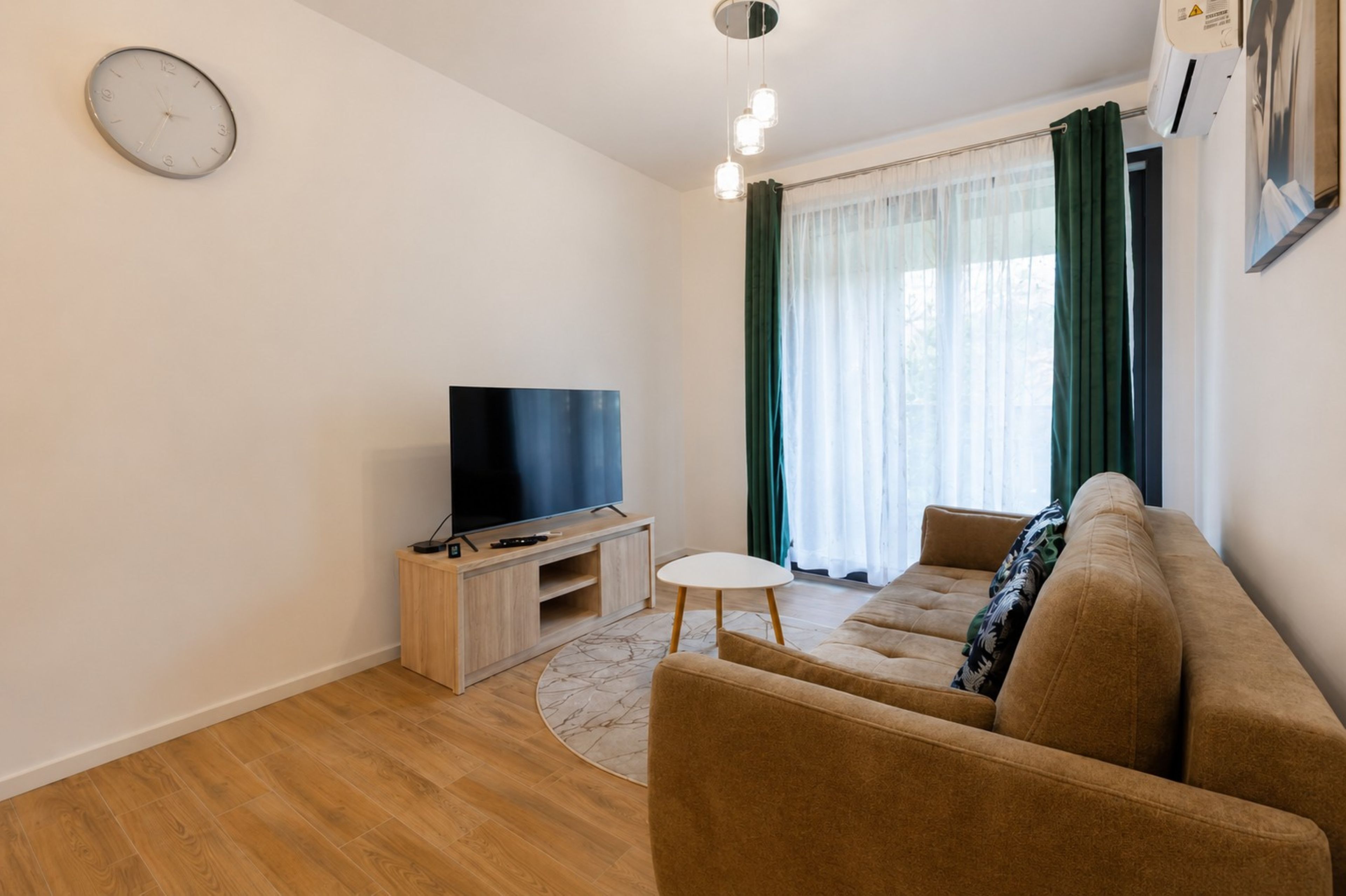Apartment (205 C) | Living area | 30-inch flat-screen TV with digital channels