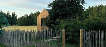 Micro house in a rose garden on a smallholding