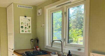 Micro house in a rose garden on a smallholding