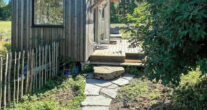 Micro house in a rose garden on a smallholding