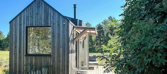 Micro house in a rose garden on a smallholding