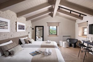 A modern bedroom with two beds, a desk, a chair, and a large window. - Villa Panorama Del Tartufo (Buzet)
