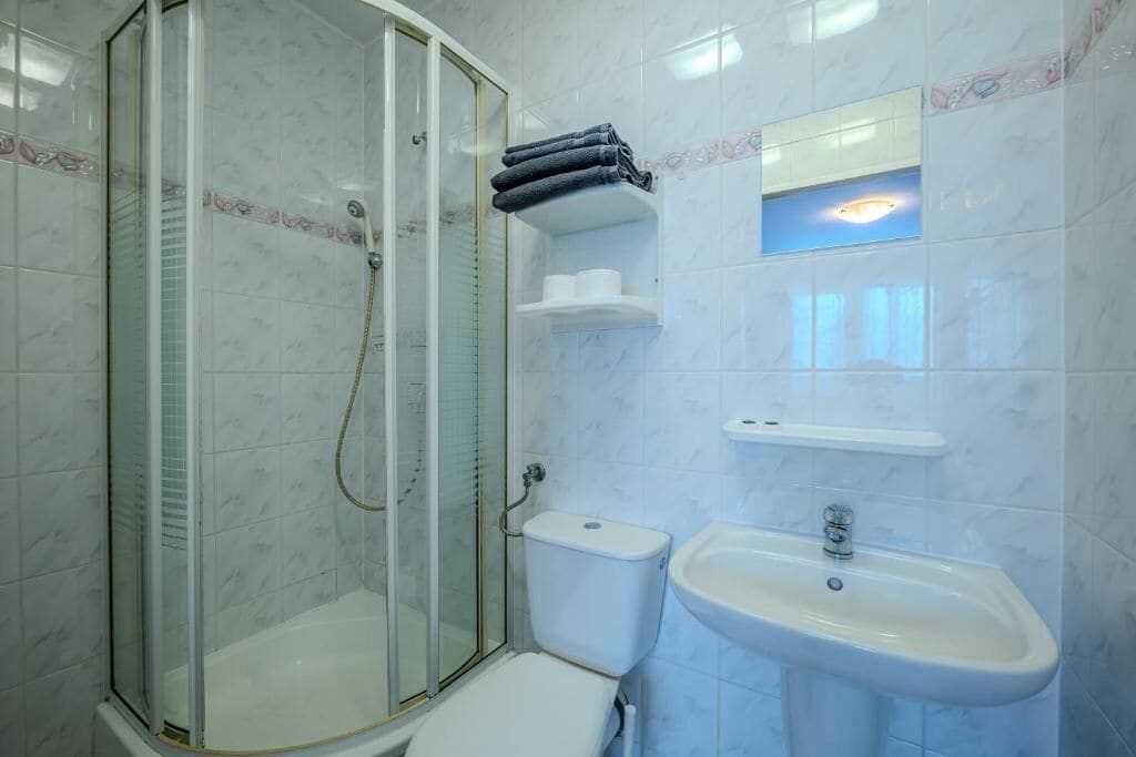 Triple Room | Bathroom | Shower, towels, soap, toilet paper