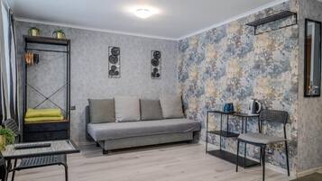 Chambre Deluxe, balcon, vue montagne | Coin séjour