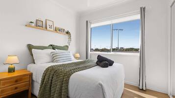 "Cosy double bedroom with a relaxing outlook over the neighbouring stables."