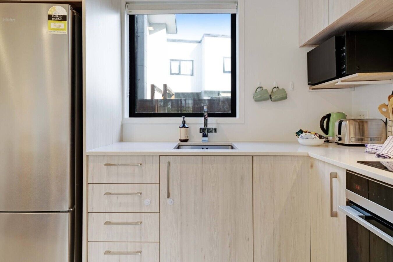 Coffee/tea maker, fridge, microwave, oven