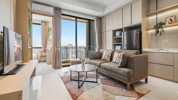 A modern apartment with a living room, kitchen, and balcony. - Brayen by Kozystay - Tebet (South Jakarta)
