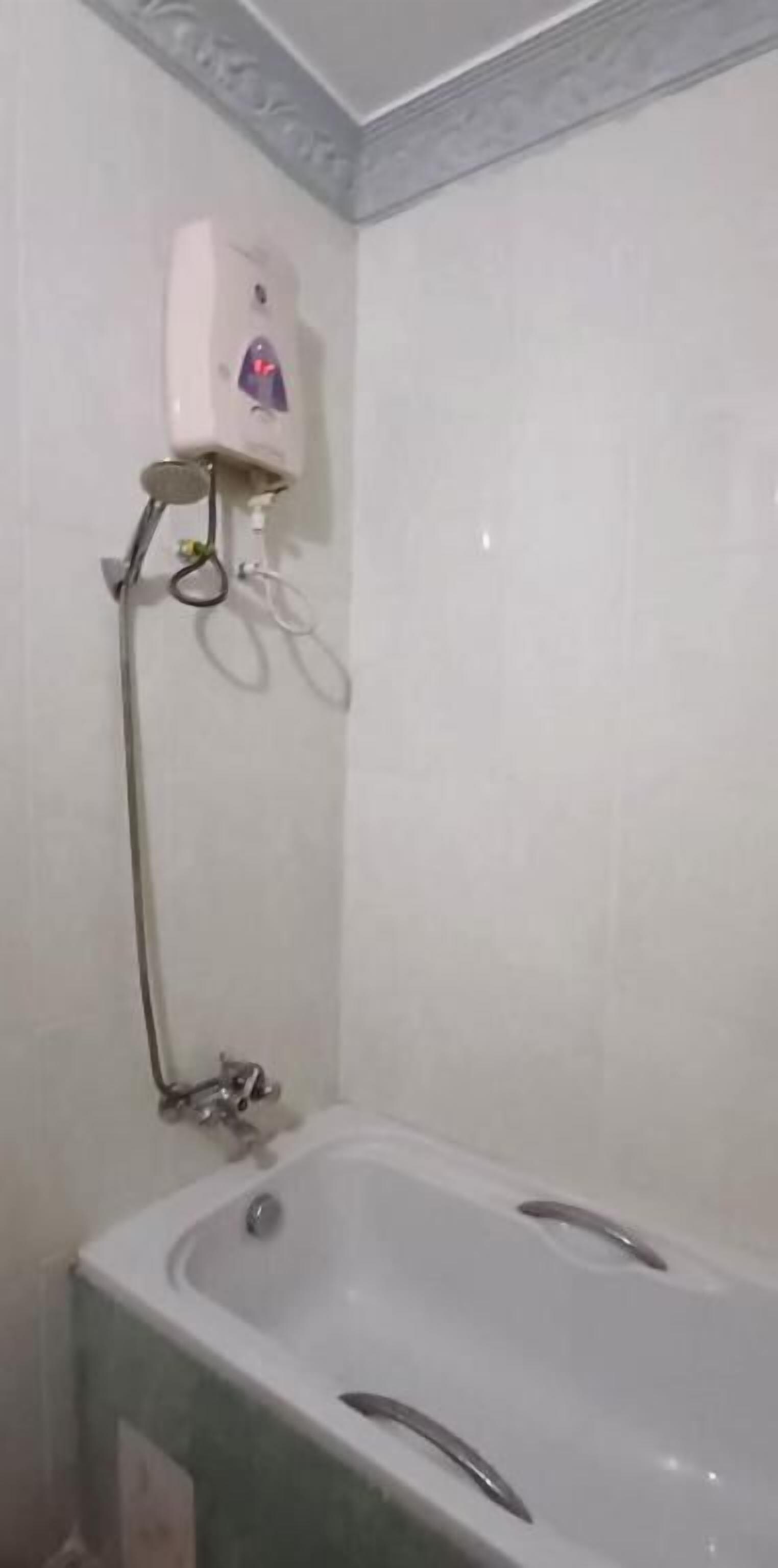 Standard Triple Room, City View | Bathroom