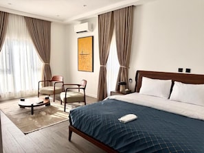 Economy Apartment, Balcony, City View | In-room safe, desk, laptop workspace, blackout drapes