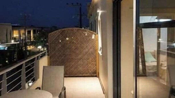 Outdoor dining - ALIA Sea & Sunset View Apartment in Kalamaki (Galatas)