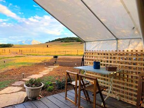 Outdoor dining - Pet-Friendly and Gorgeous Safari Tent for a Glamping Getaway near White River National Forest, Colorado (Carbondale)