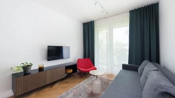Apartamento (18) | Área de estar | TV de tela plana 30 polegadas com canais digitais