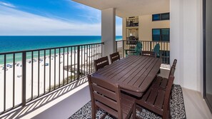 A balcony with a view of the beach and ocean. - Phoenix Iii 3101 3 Bedroom Condo (Orange Beach)