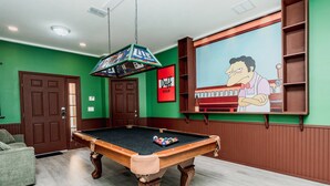 A pool table with balls, a green wall, a door, and a 'Duff Beer' sign. - 5BR Veranda Palms Home Near Disney for 14 (Kissimmee)