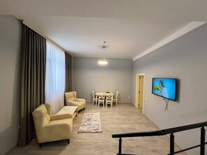 Cottage, vue jardin | Coin séjour