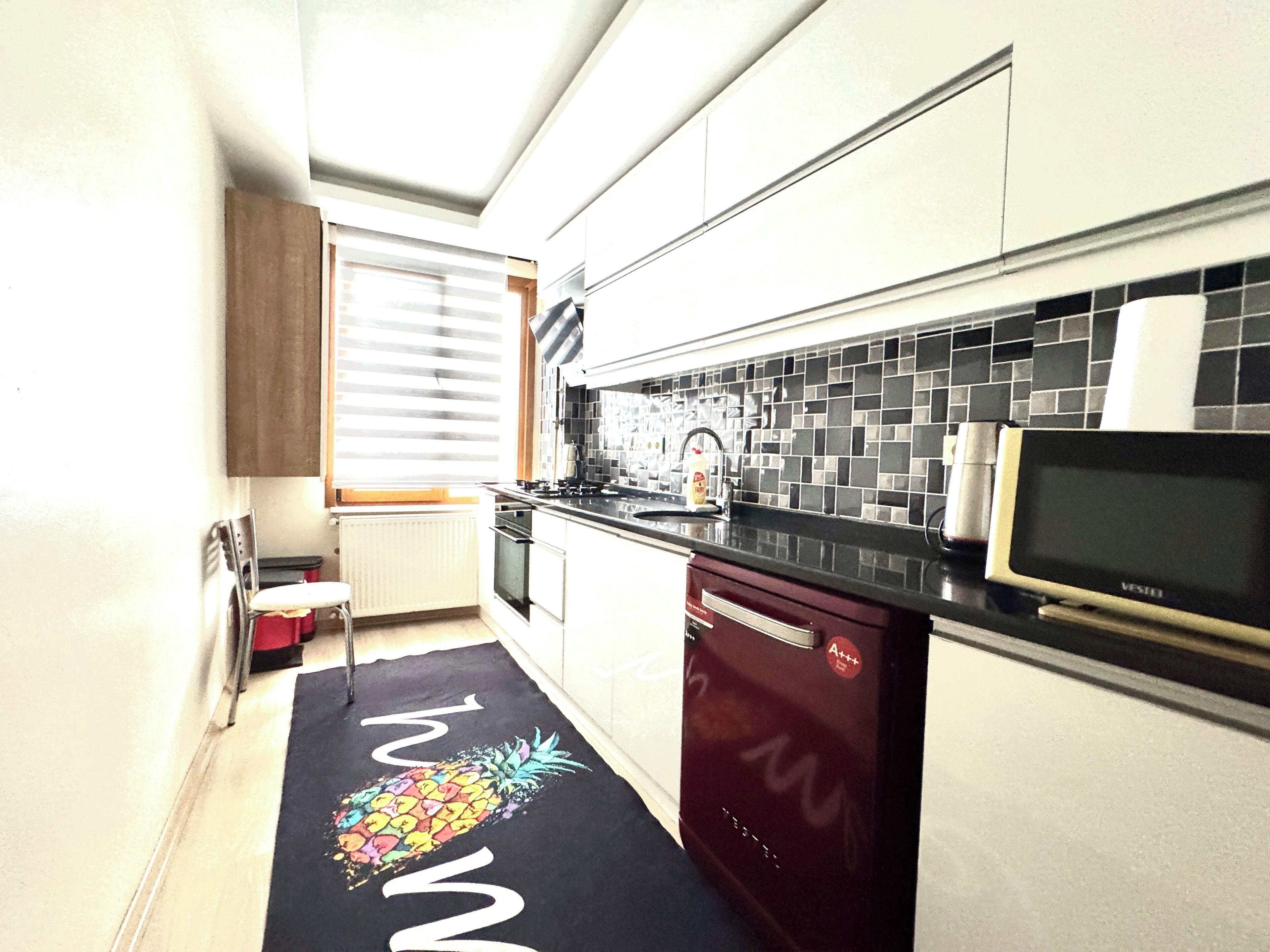 Luxury-Zweibettzimmer, Balkon, Stadtblick | Eigene Kochnische | Herdplatte