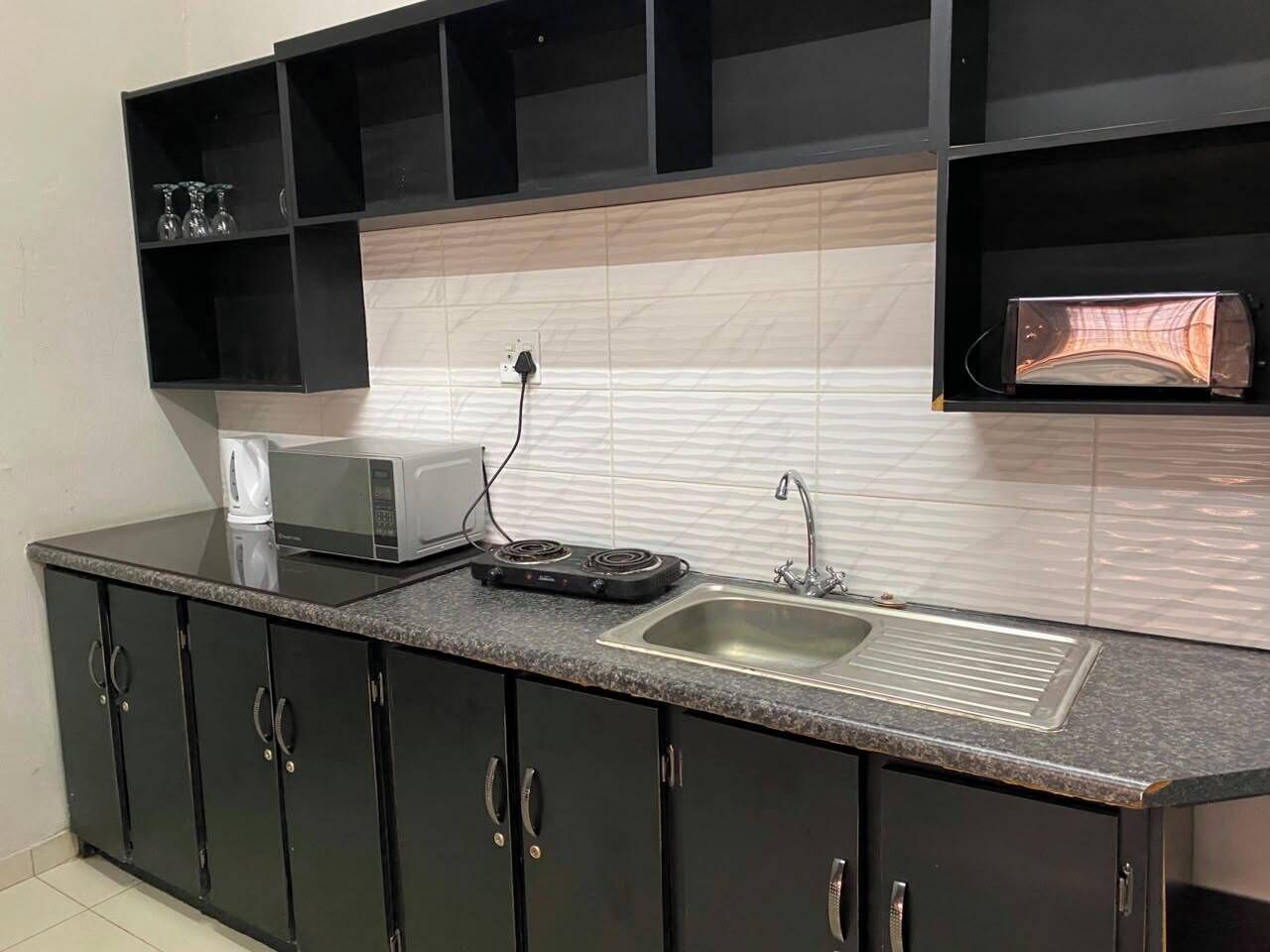 Family Room, River View | Private kitchen | Fridge, microwave, cookware/dishes/utensils