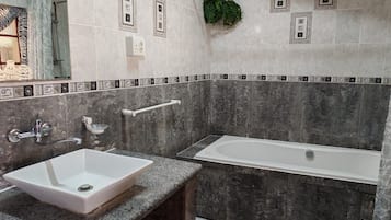 Family Room, River View | Bathroom | Combined shower/bathtub, toilet paper